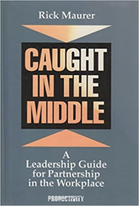 Caught in the Middle: A Leadership Guide for Partnership in the Workplace